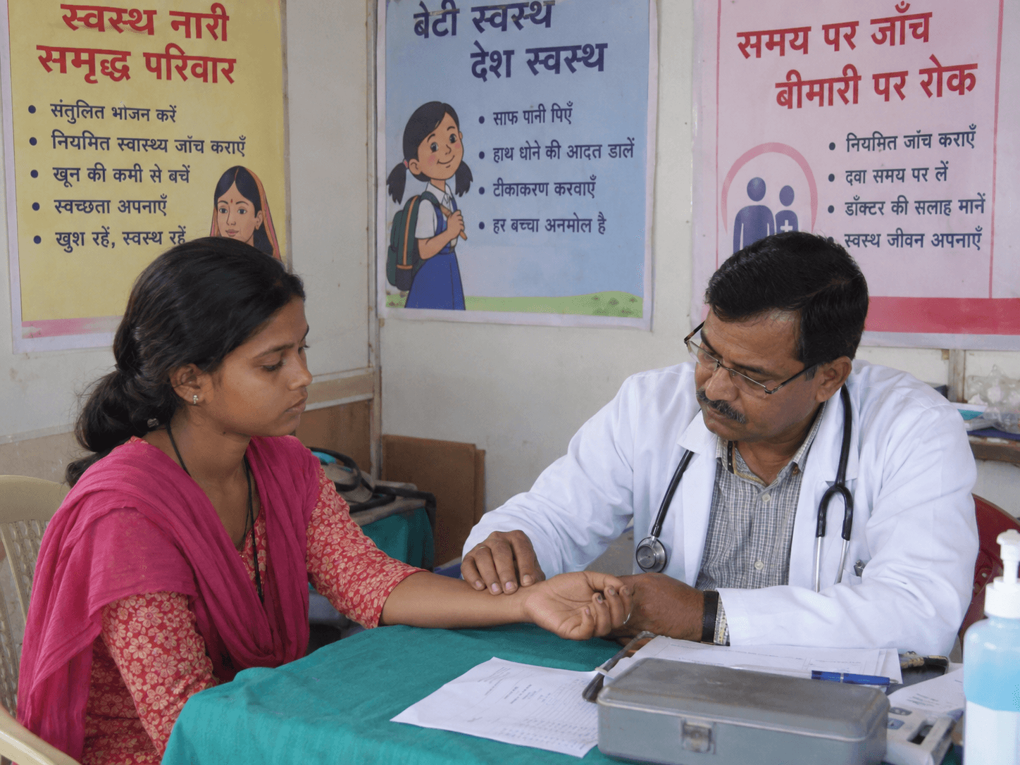 A woman receiving a routine health check during a community medical programme
